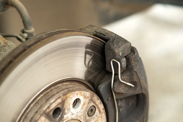 Close-up of caliper on brake rotor